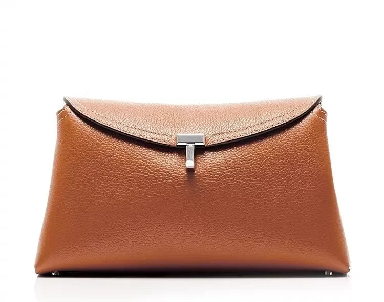 Chic Minimalist Single Shoulder Baguette Handbag with T Lock Closure in High-Quality Calfskin