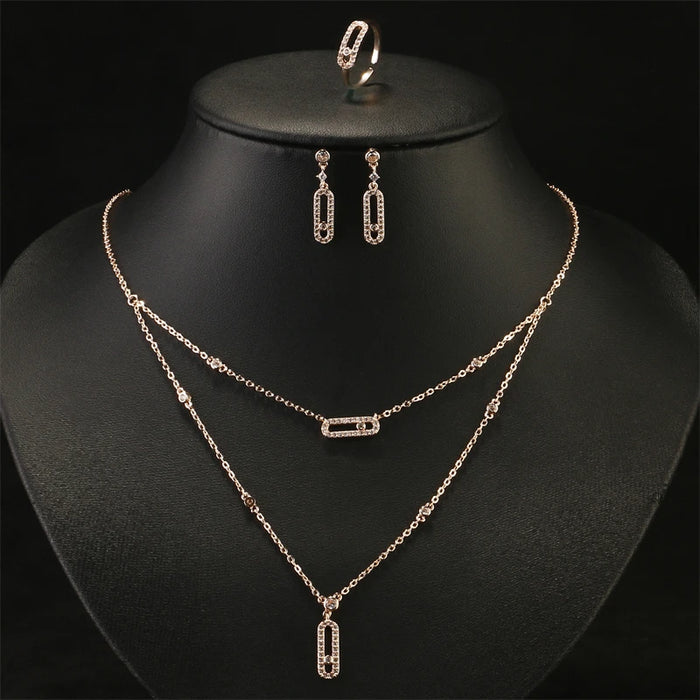 RAKOL Ensemble de bijoux géométriques double couche avec collier, boucles d'oreilles, bague et bracelet pour femme – Cadeaux élégants pour les occasions festives