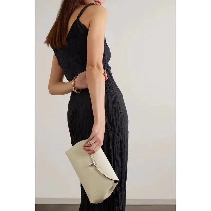 Chic Minimalist Single Shoulder Baguette Handbag with T Lock Closure in High-Quality Calfskin