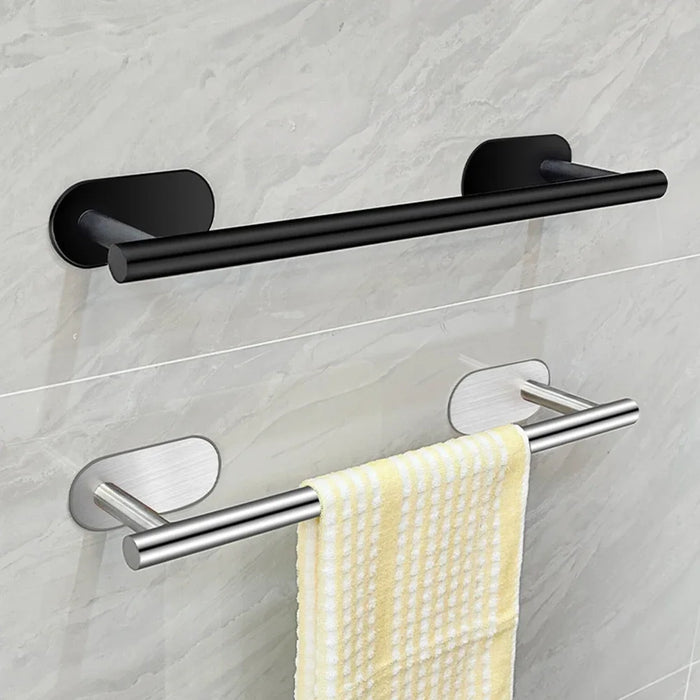 Práctico paquete de 4 accesorios autoadhesivos para baño y cocina: toalleros, portarrollos y ganchos