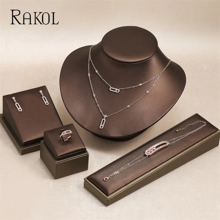 RAKOL Ensemble de bijoux géométriques double couche avec collier, boucles d'oreilles, bague et bracelet pour femme – Cadeaux élégants pour les occasions festives