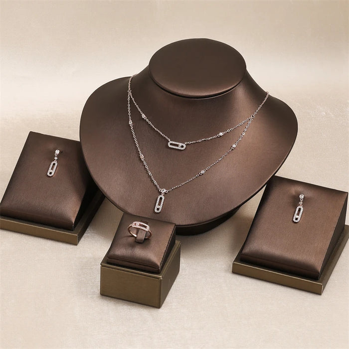 RAKOL Ensemble de bijoux géométriques double couche avec collier, boucles d'oreilles, bague et bracelet pour femme – Cadeaux élégants pour les occasions festives