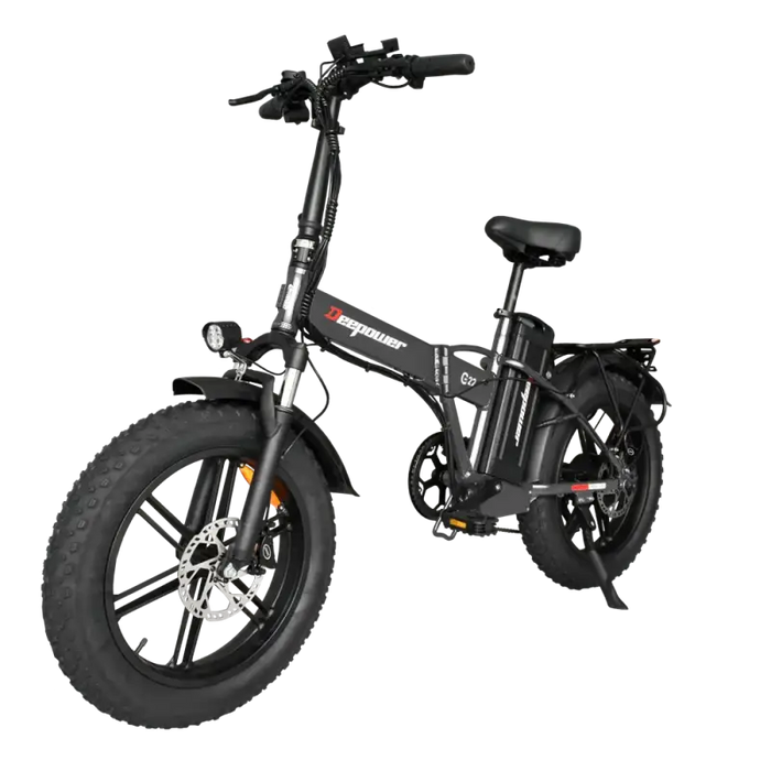 Black folding electric fat-tire bicycle with pedal assist.