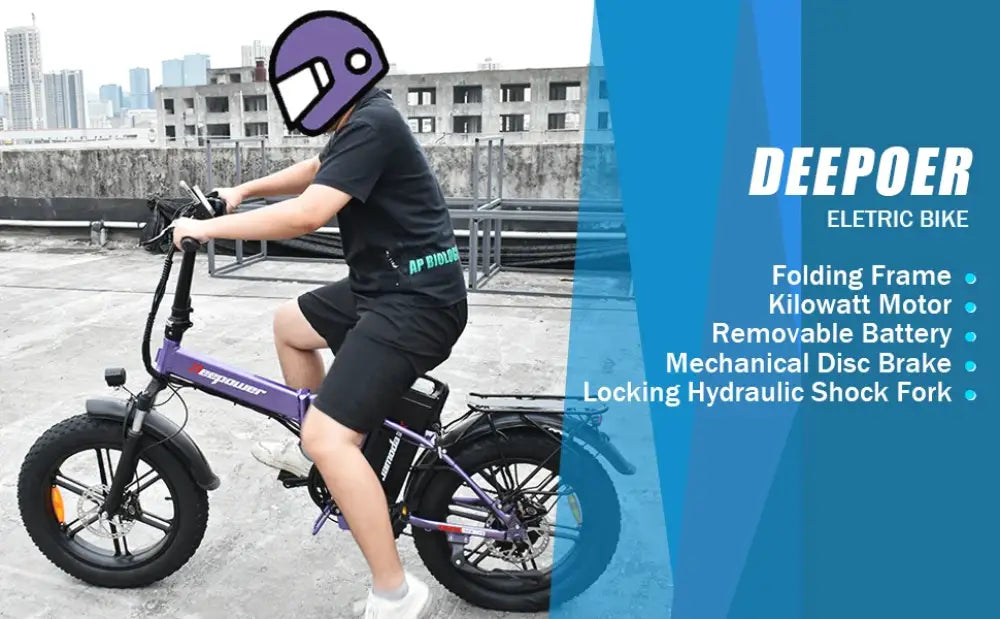 Purple and black electric folding bike with fat tires.