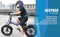 Purple and black electric folding bike with fat tires.